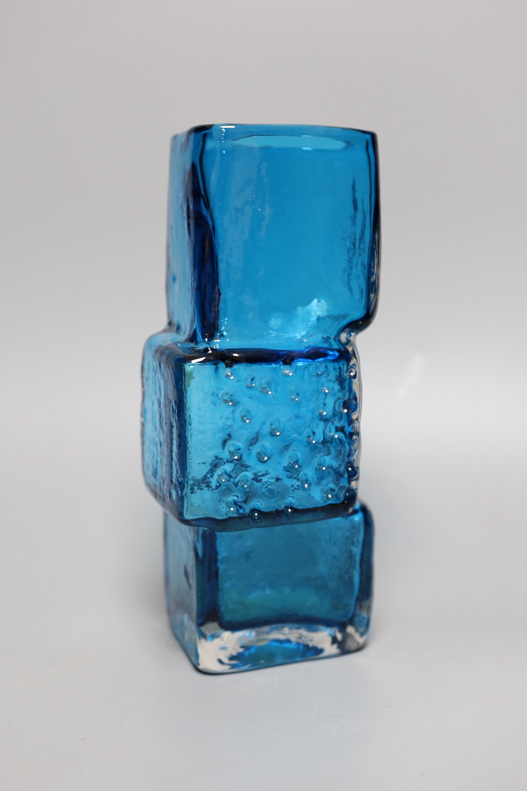 A Whitefriars 'Drunken Bricklayer's' glass vase, designed by Geoffrey Baxter, pattern number 9673, blue glass, 21cm tall